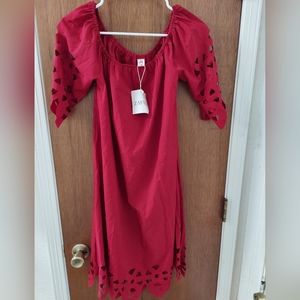 Red cocktail dress with cut out accents